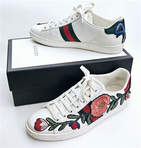 gucci white floral sneakers|Gucci ace low top sneakers.